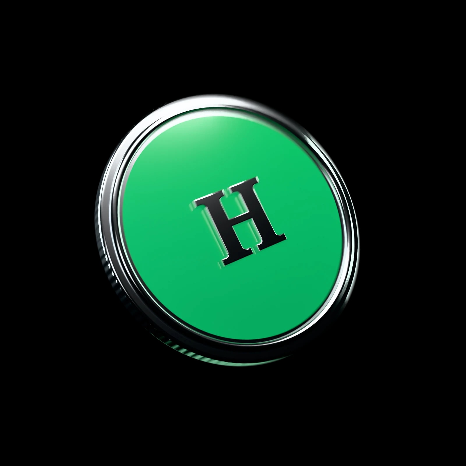 A green enamel coin with a chrome H, caught mid-flip